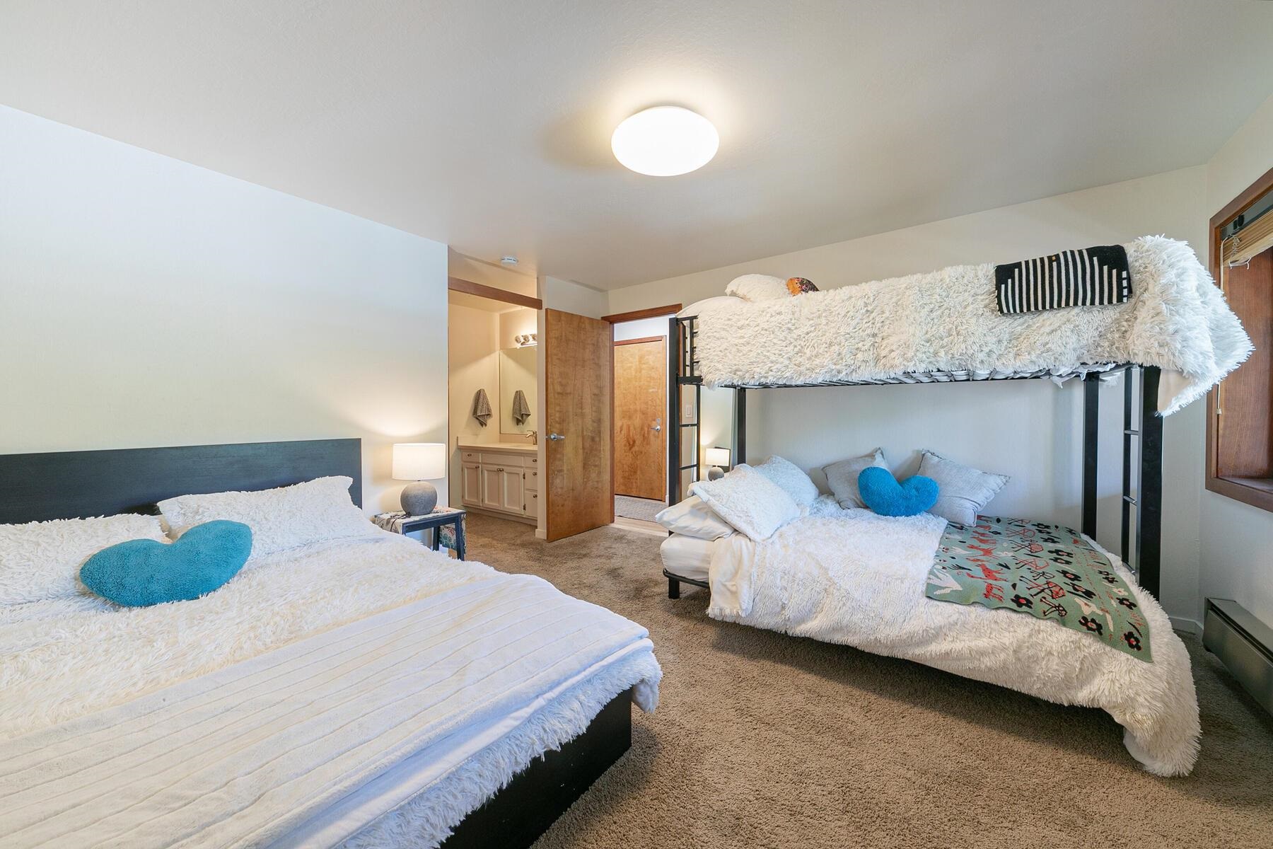 3003 Meadow Court, Unit 5 Olympic Valley, CA 96146 - Photo 17 of 28 a bedroom with bed and a window