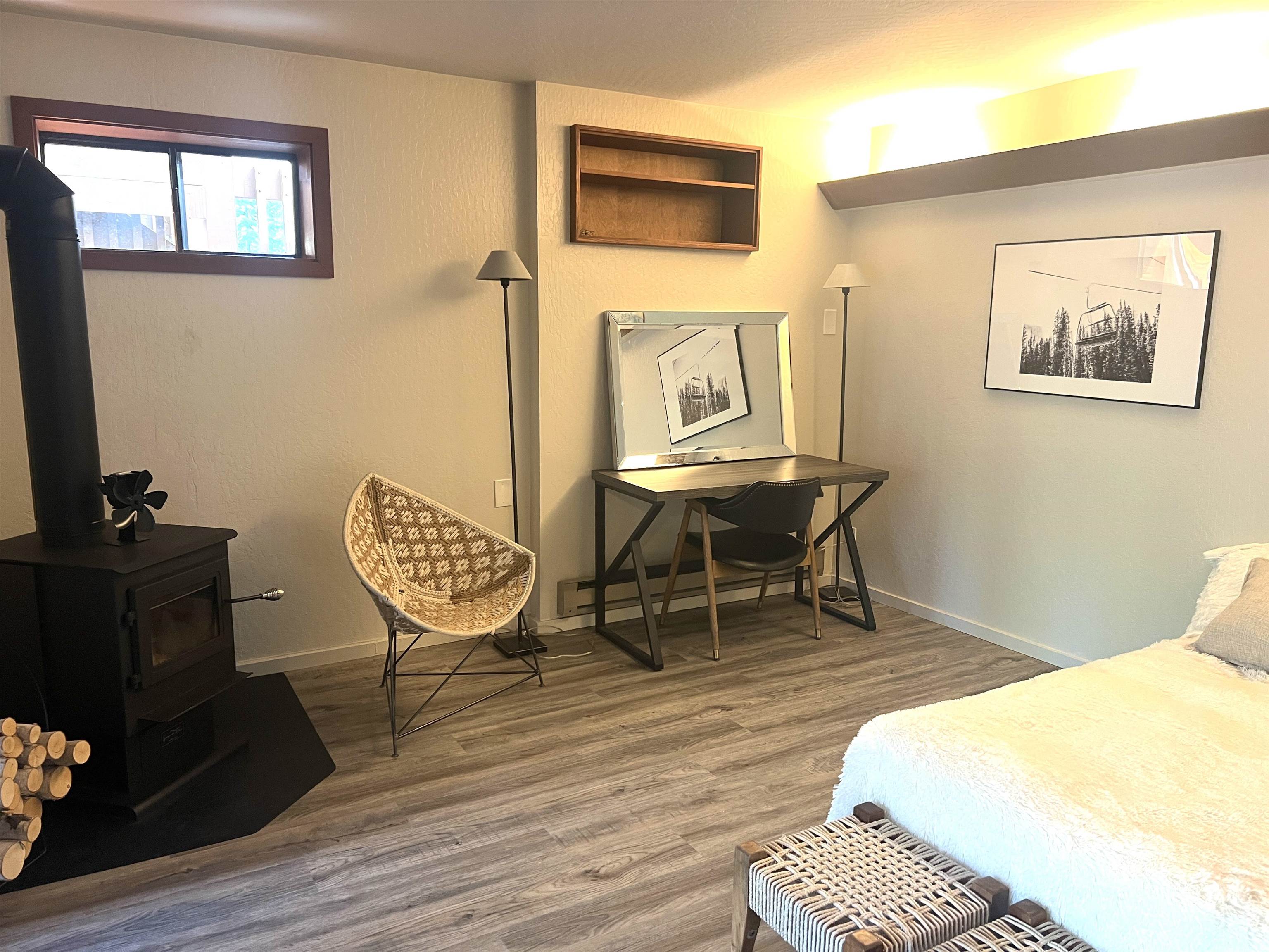 3003 Meadow Court, Unit 5 Olympic Valley, CA 96146 - Photo 19 of 28 a bedroom with a bed and wooden floor