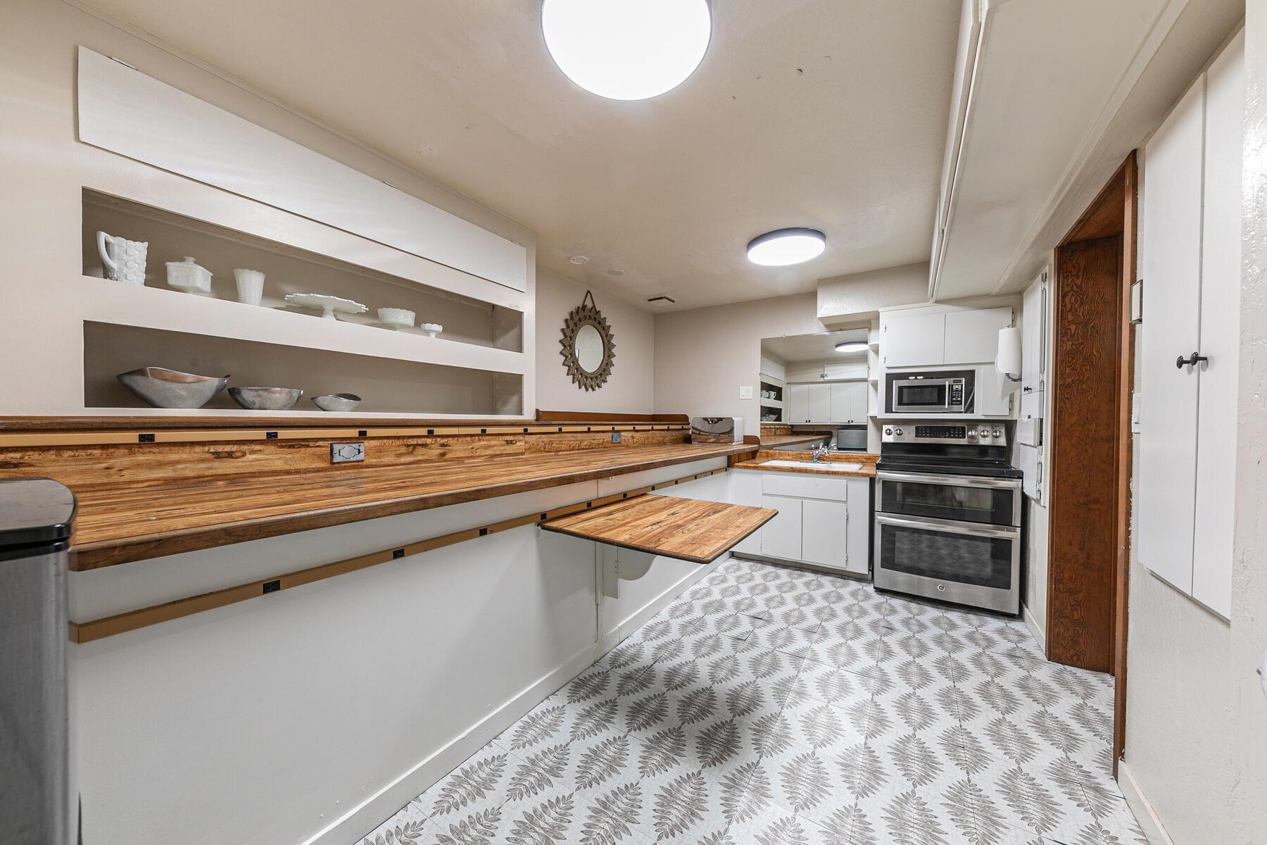 3003 Meadow Court, Unit 5 Olympic Valley, CA 96146 - Photo 20 of 28 a kitchen with stainless steel appliances granite countertop a sink and cabinets