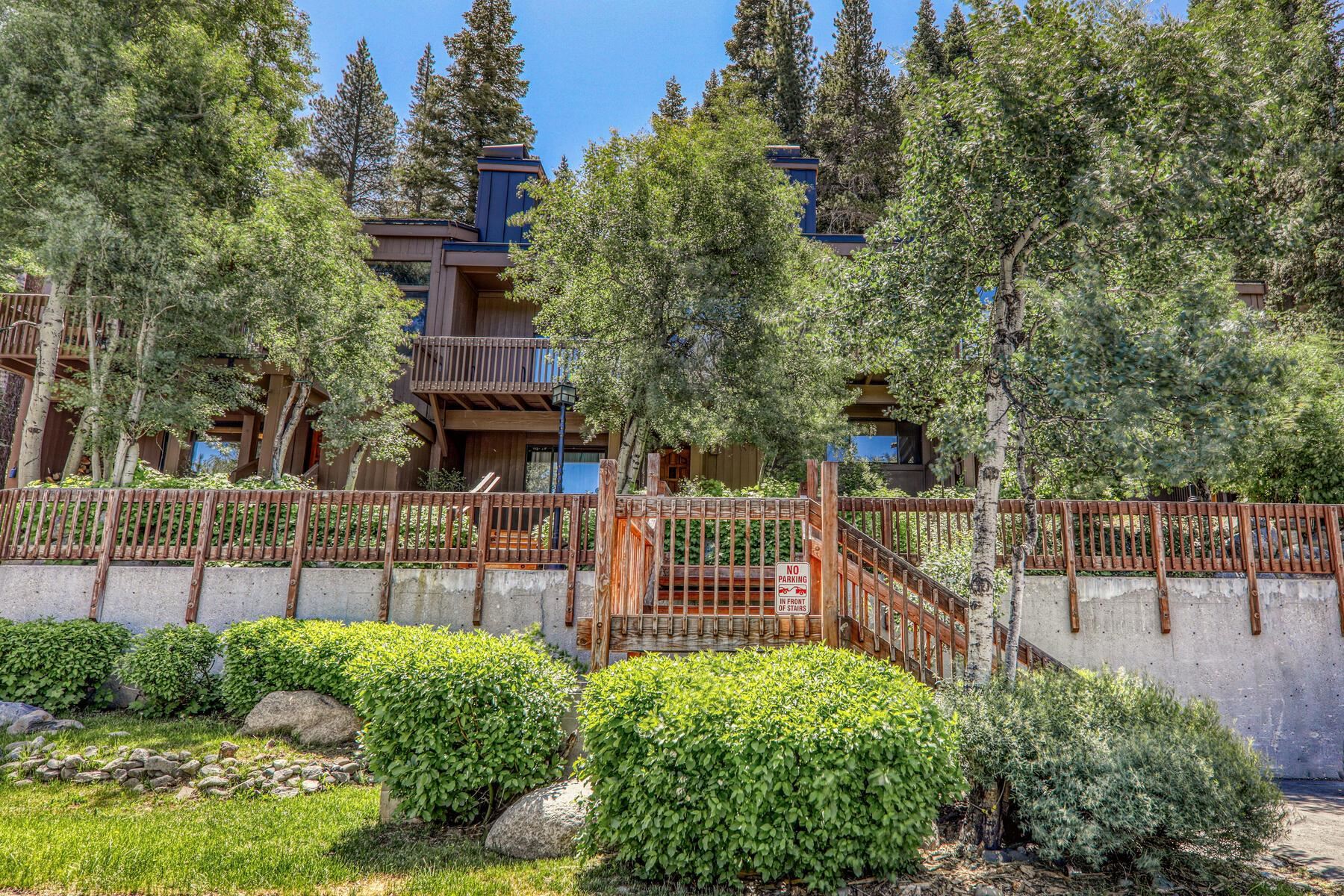 3003 Meadow Court, Unit 5 Olympic Valley, CA 96146 - Photo 3 of 28 a view of house with a small yard and wooden fence