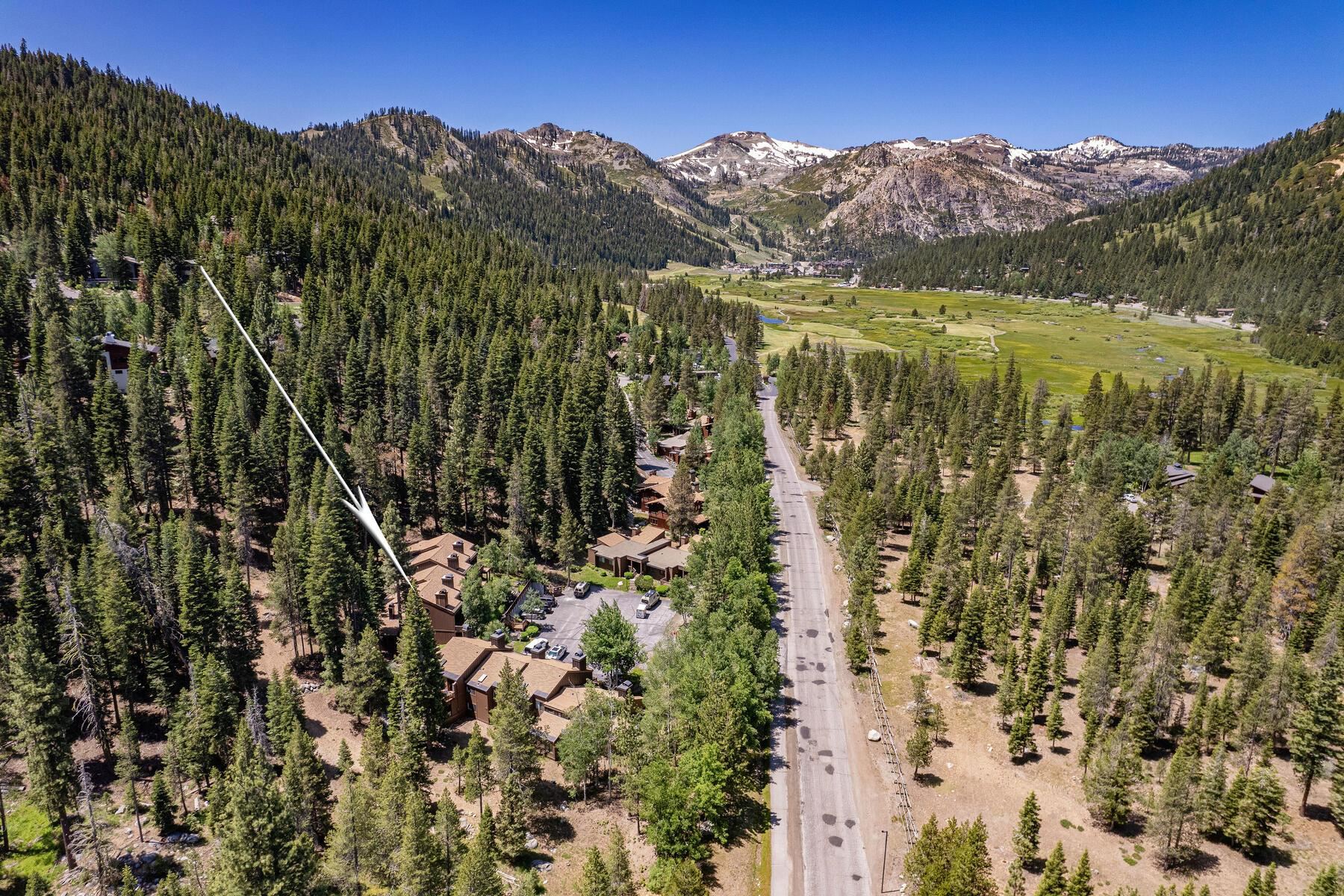 3003 Meadow Court, Unit 5 Olympic Valley, CA 96146 - Photo 4 of 28 a view of a city with mountains in the background