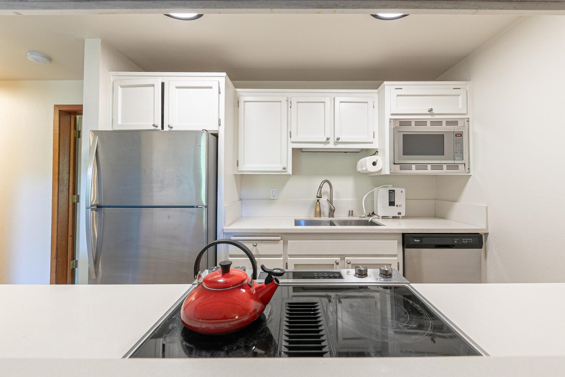 3003 Meadow Court, Unit 5 Olympic Valley, CA 96146 - Photo 9 of 28 a kitchen with kitchen island a sink stove and refrigerator