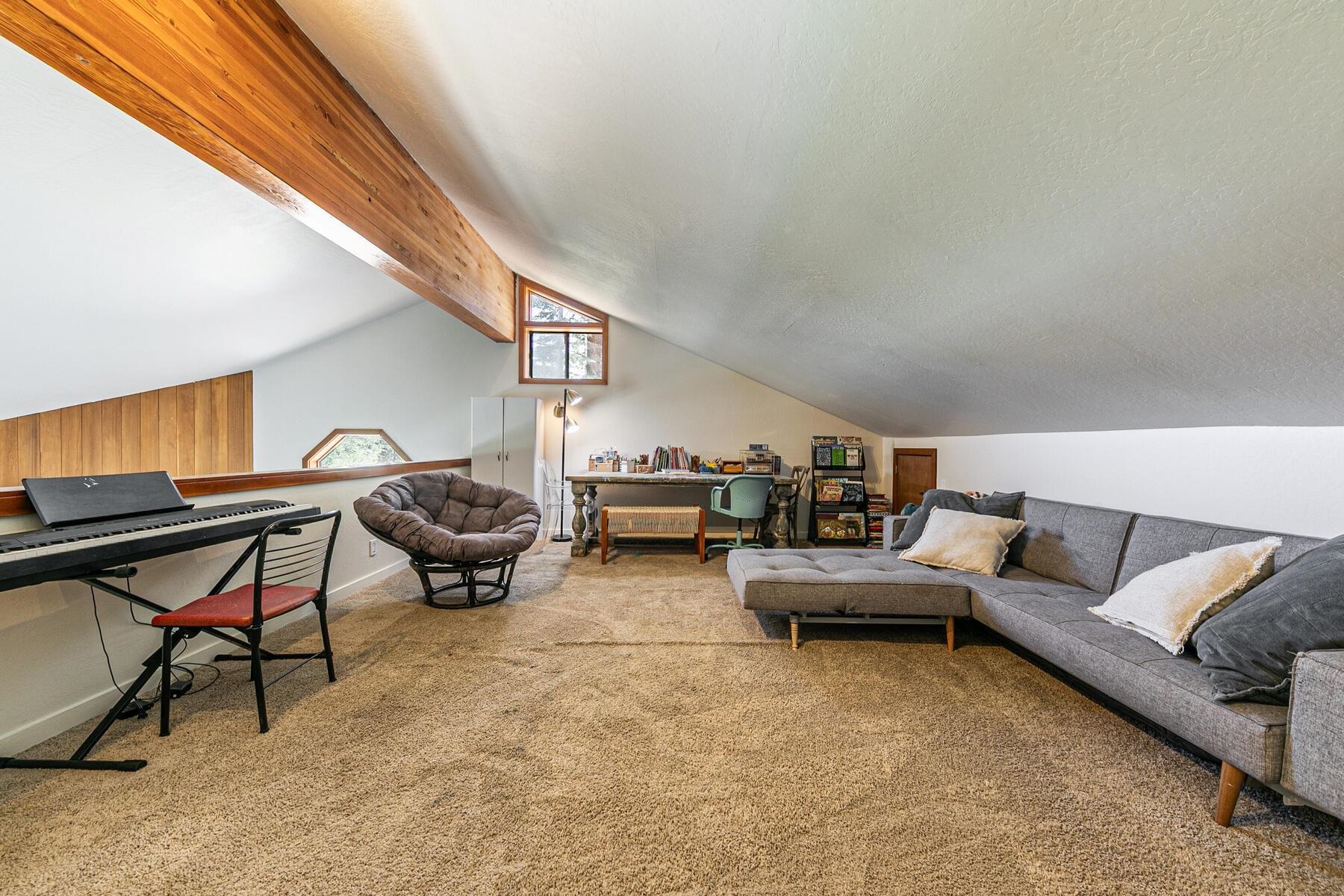 3003 Meadow Court, Unit 5 Olympic Valley, CA 96146 - Photo 10 of 28 a living room with furniture and a window