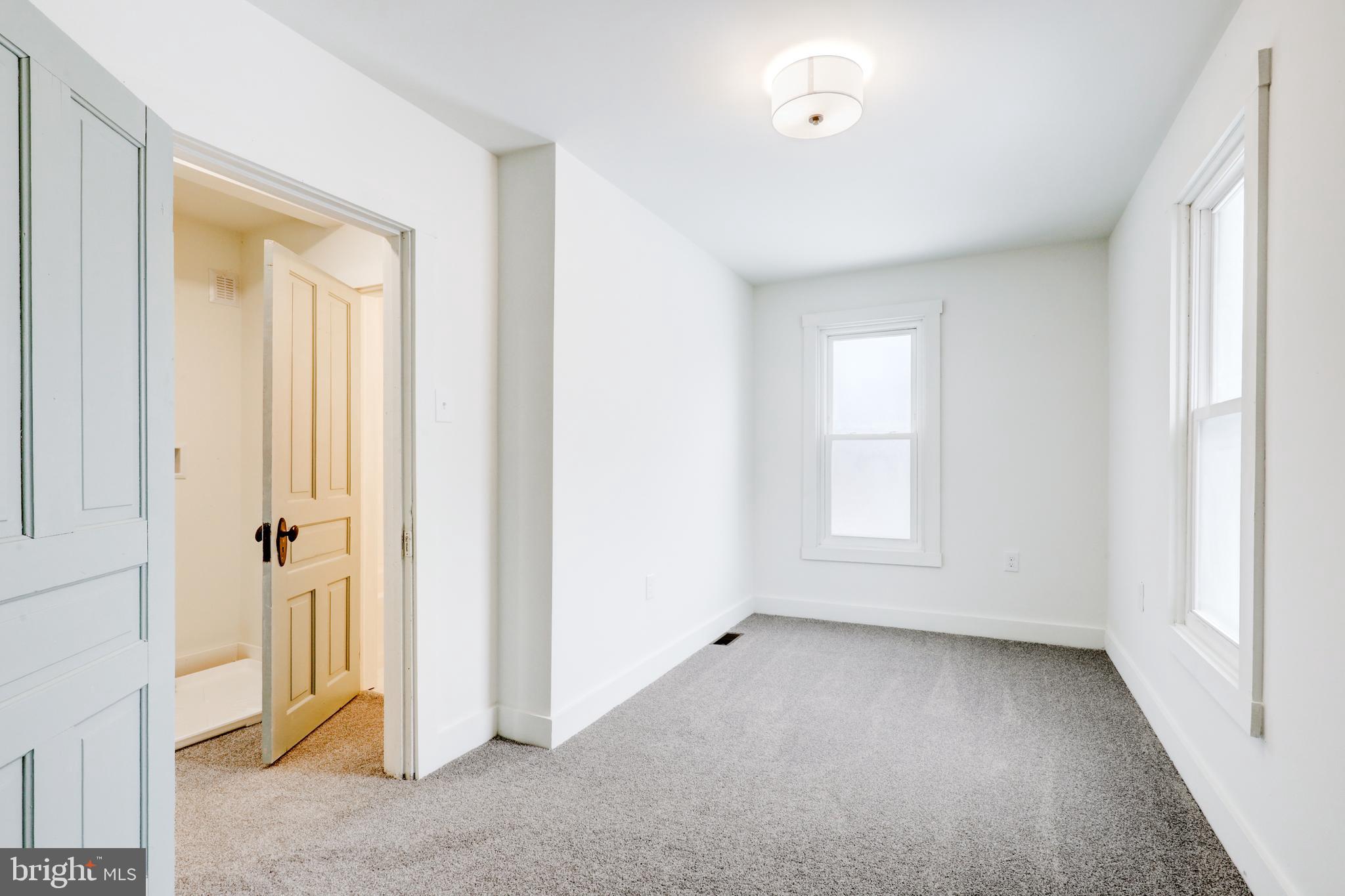 711 Main Street Lykens, PA 17048 - Photo 16 of 38 an empty room with windows