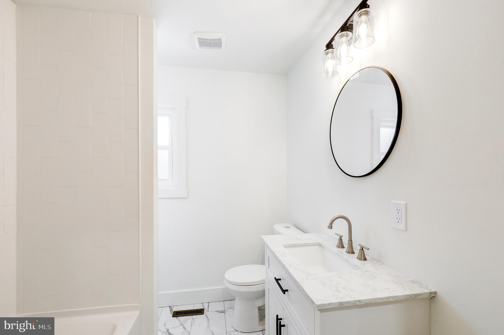 711 Main Street Lykens, PA 17048 - Photo 19 of 38 a bathroom with a sink and a mirror