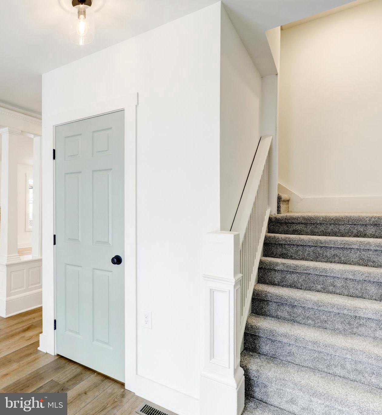711 Main Street Lykens, PA 17048 - Photo 2 of 38 a view of staircase with white walls and white door