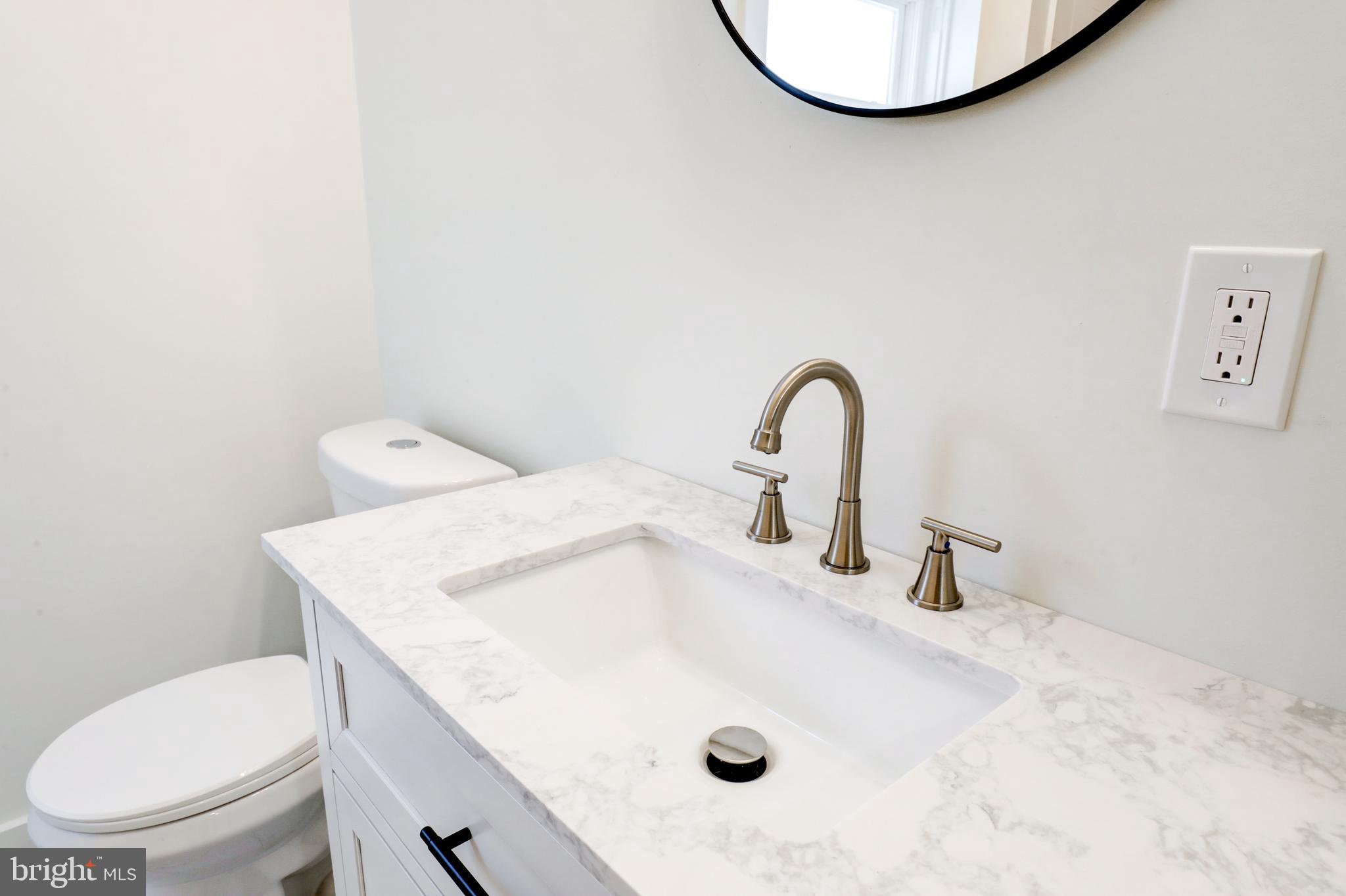 711 Main Street Lykens, PA 17048 - Photo 22 of 38 a bathroom with a sink and a toilet