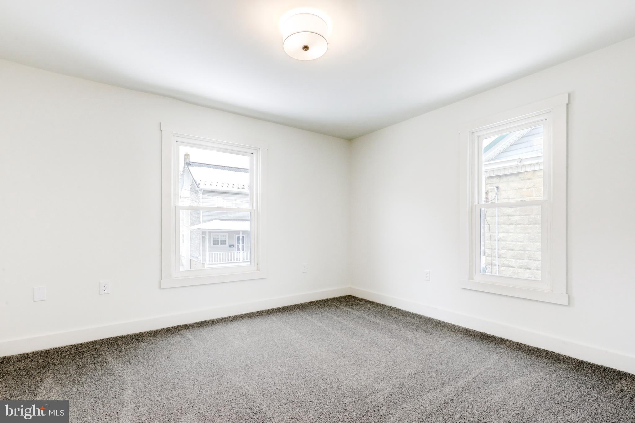 711 Main Street Lykens, PA 17048 - Photo 25 of 38 an empty room with a window