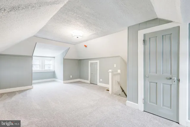 an empty room with a natural light