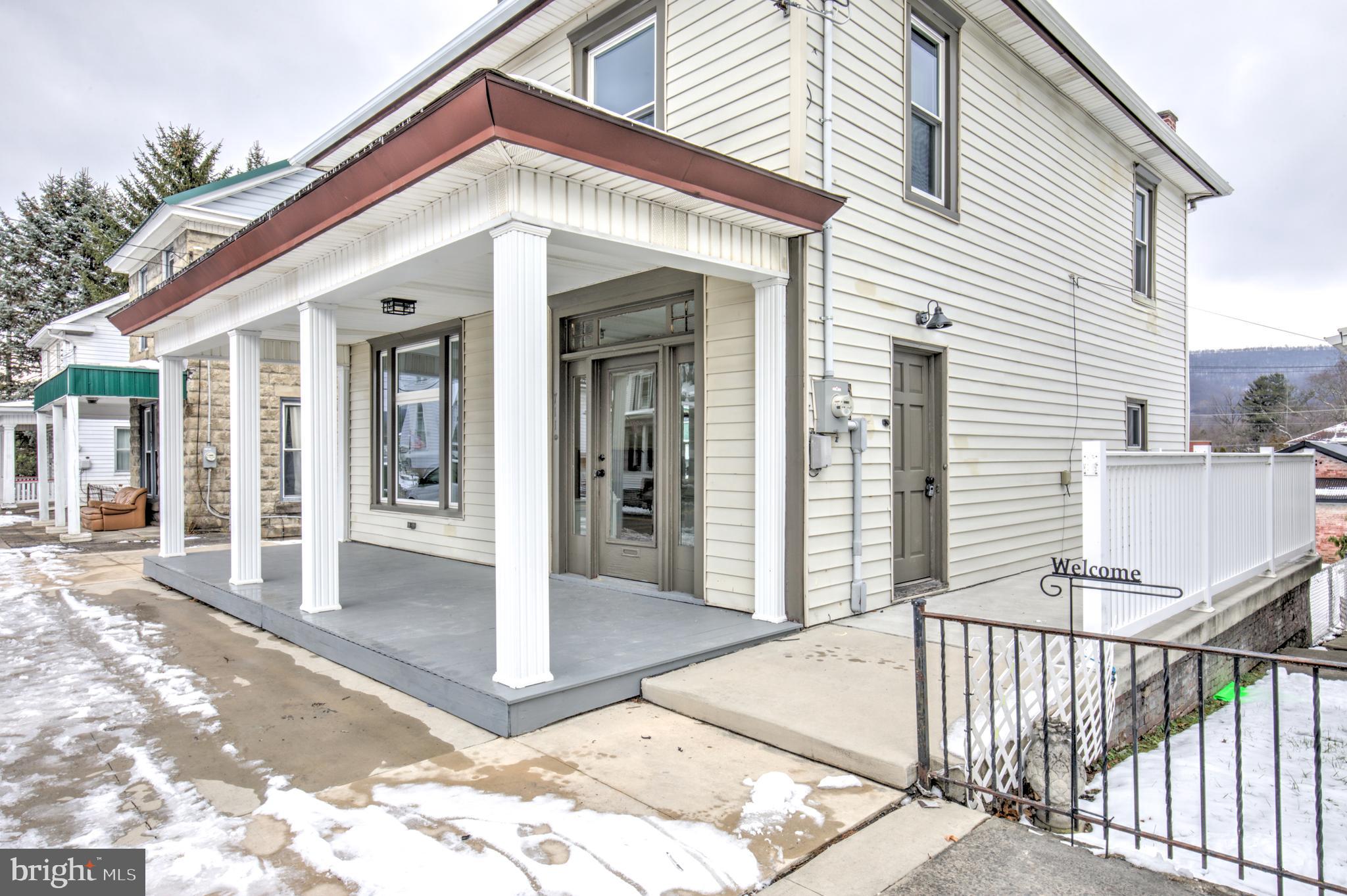 711 Main Street Lykens, PA 17048 - Photo 34 of 38 a front view of a house with a porch