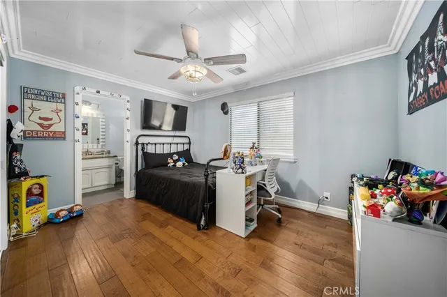 a view of a workspace with furniture and a kitchen