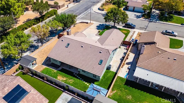 a view of a chairs and table in the patio