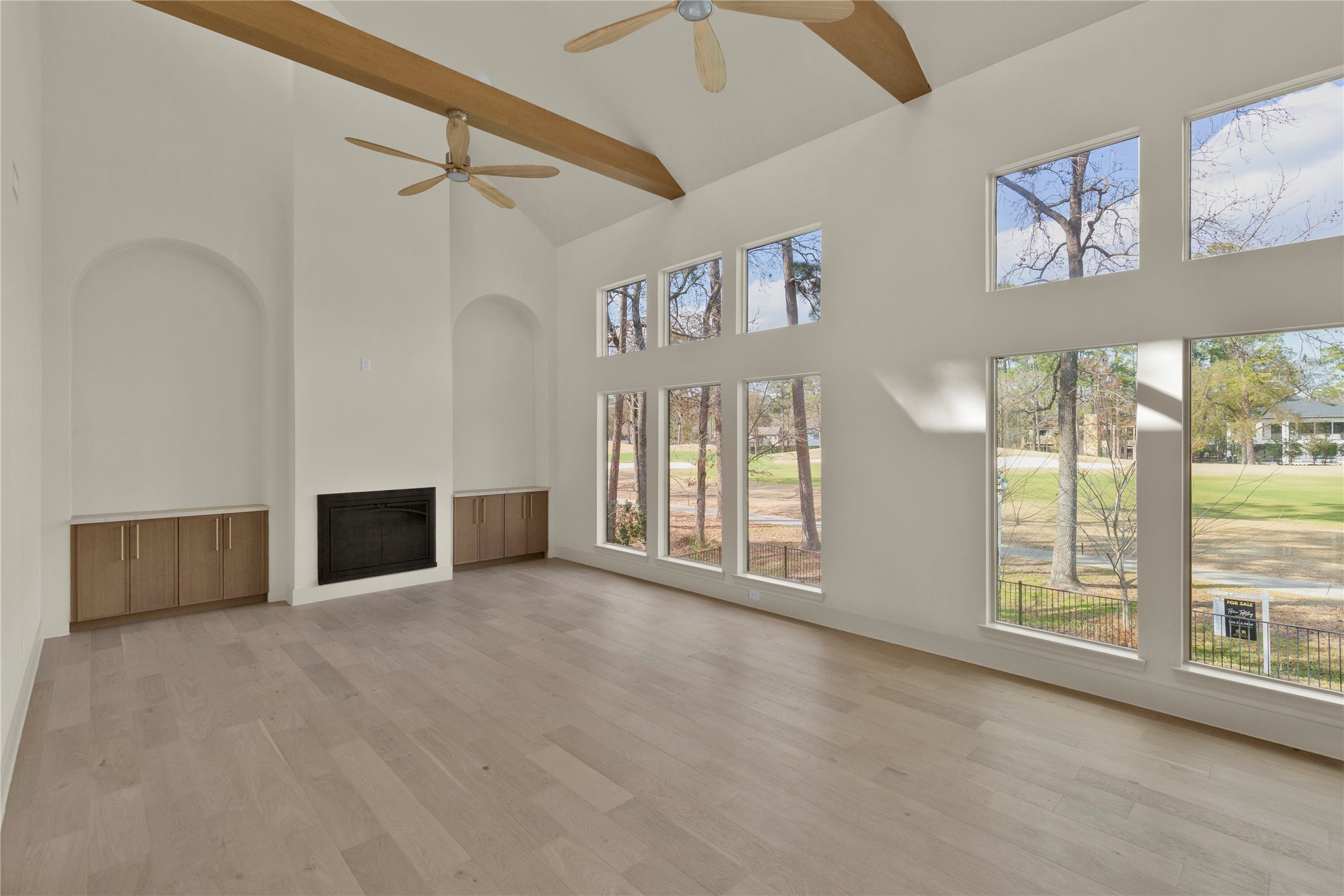 20 Buttonbush Court The Woodlands, TX 77380 - Photo 16 of 43 a view of an empty room with a window