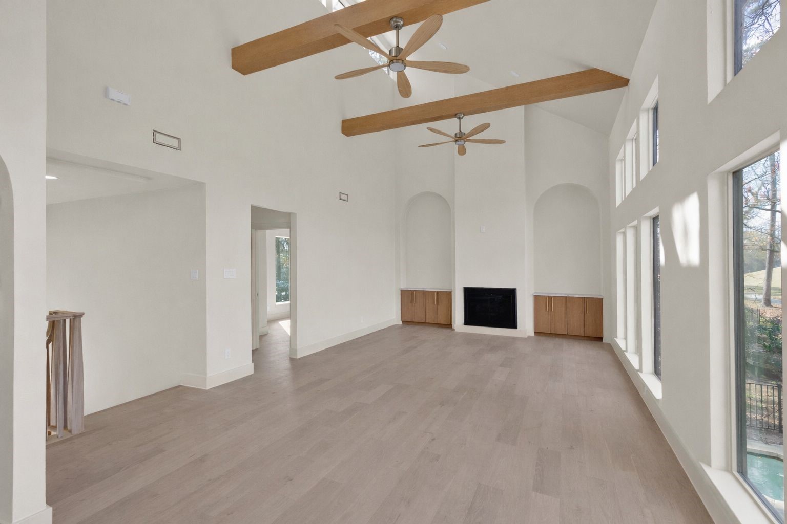 20 Buttonbush Court The Woodlands, TX 77380 - Photo 17 of 43 a view of a big room with closet and windows