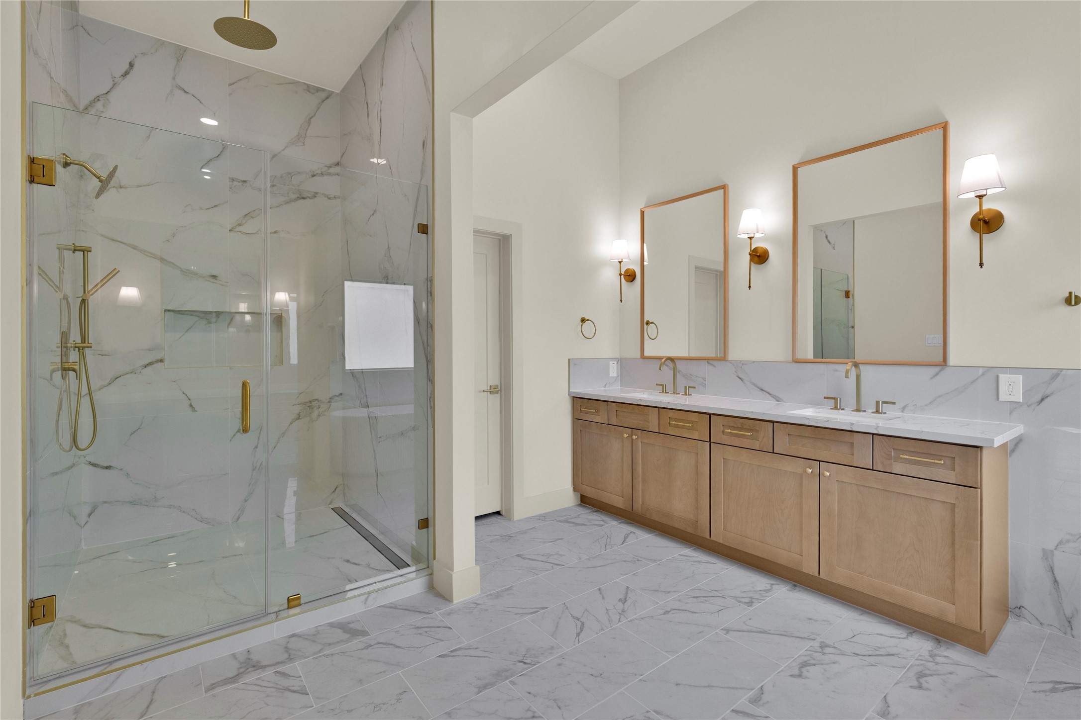 20 Buttonbush Court The Woodlands, TX 77380 - Photo 23 of 43 a spacious bathroom with a shower sink and mirror