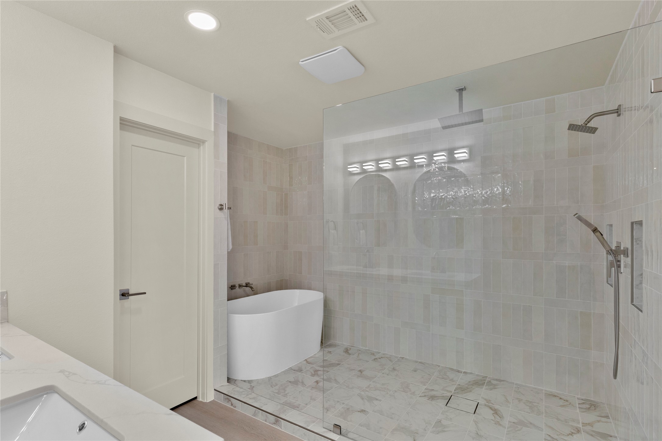 20 Buttonbush Court The Woodlands, TX 77380 - Photo 29 of 43 a bathroom with a shower and toilet
