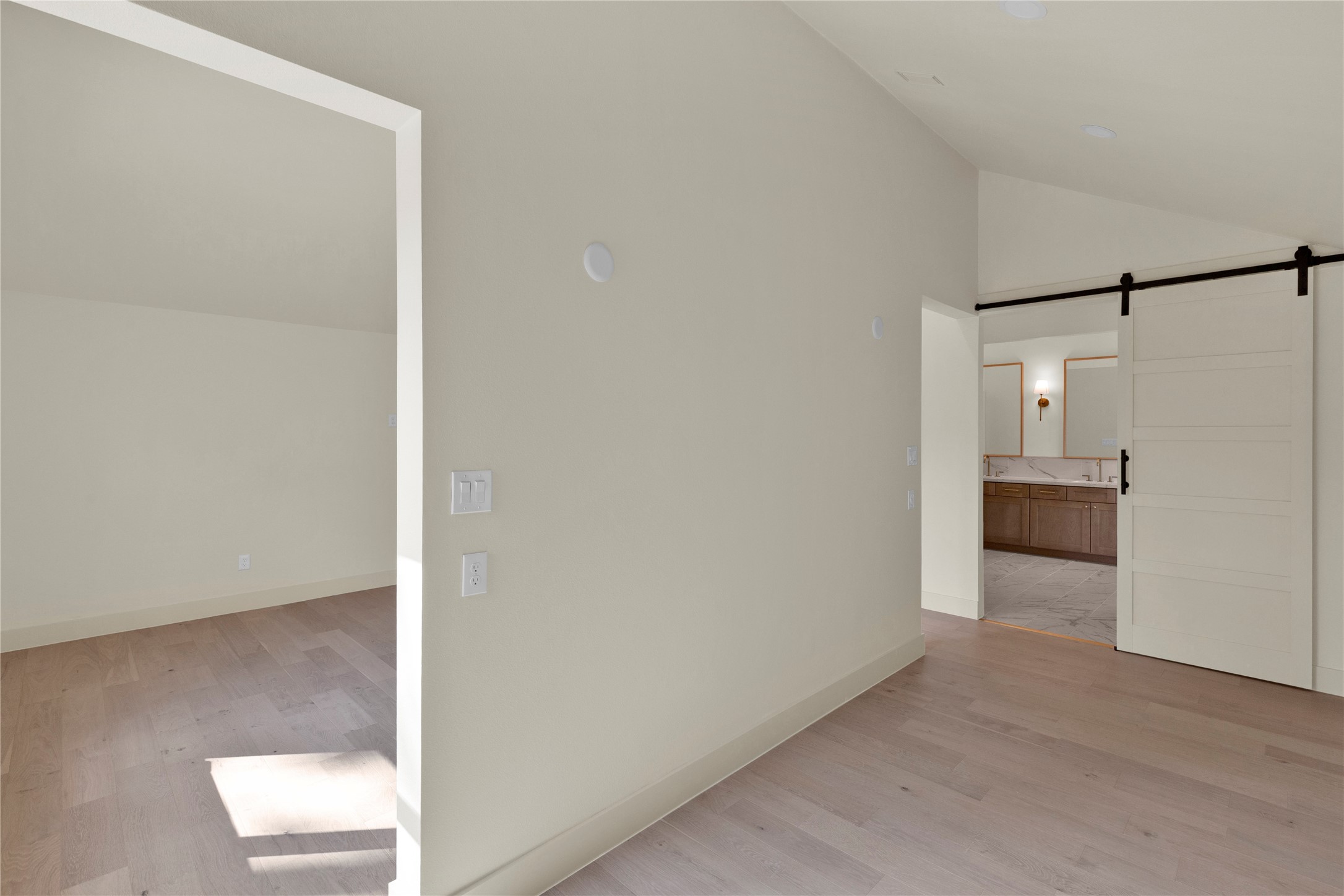 20 Buttonbush Court The Woodlands, TX 77380 - Photo 30 of 43 a view of a hallway with an empty room