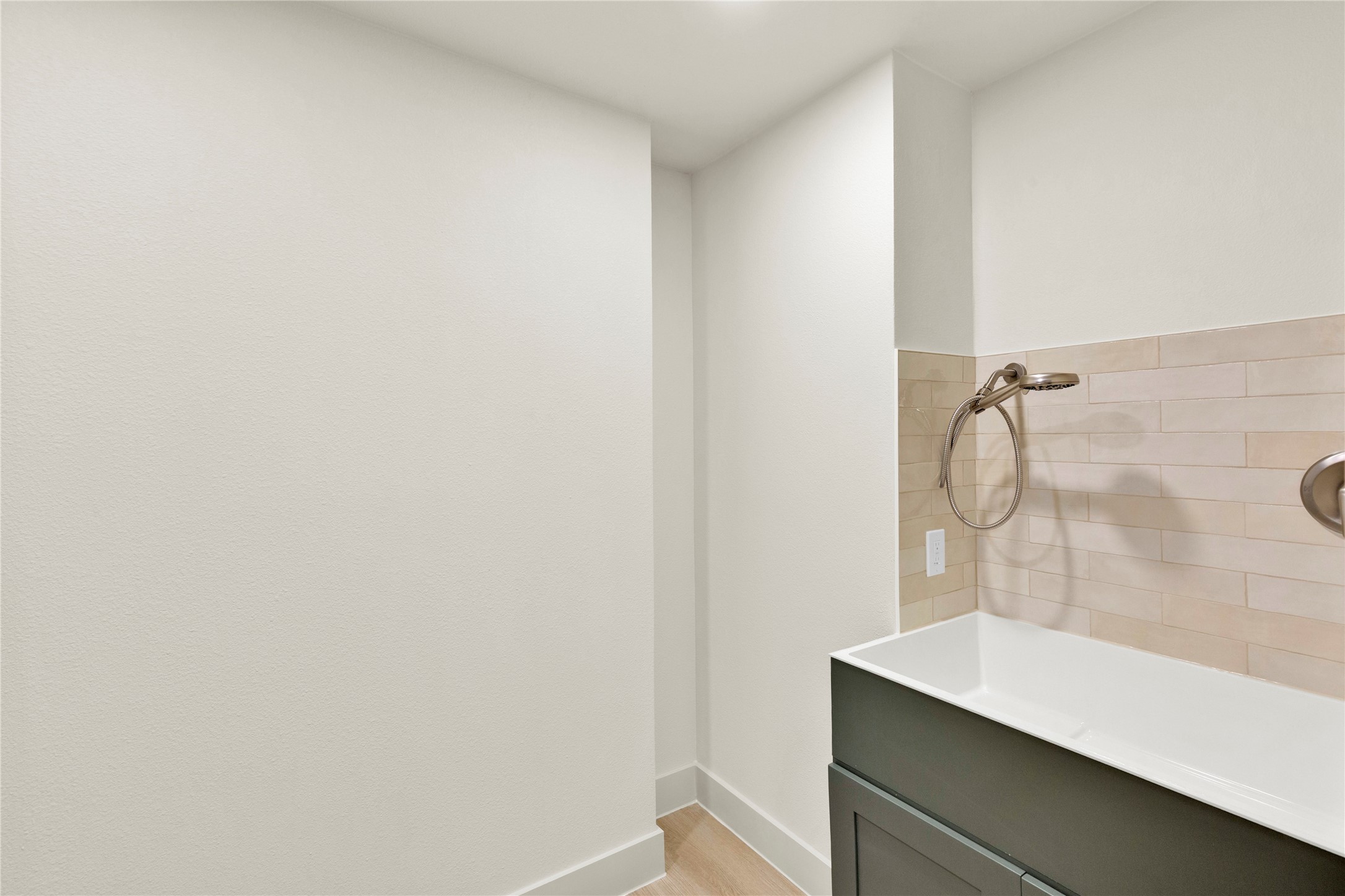 20 Buttonbush Court The Woodlands, TX 77380 - Photo 32 of 43 a bathroom with a sink and vanity