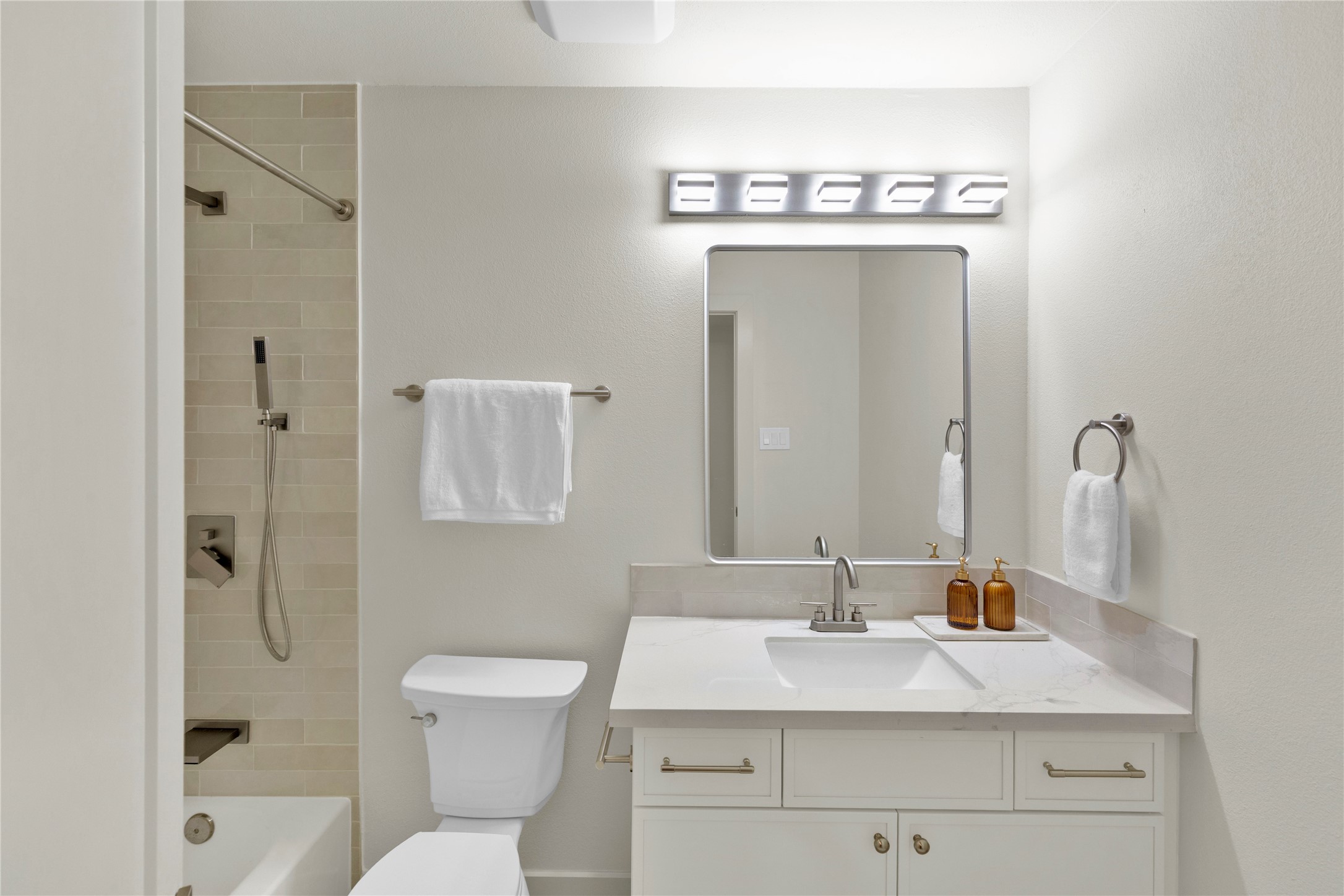 20 Buttonbush Court The Woodlands, TX 77380 - Photo 36 of 43 a bathroom with a sink a toilet and shower