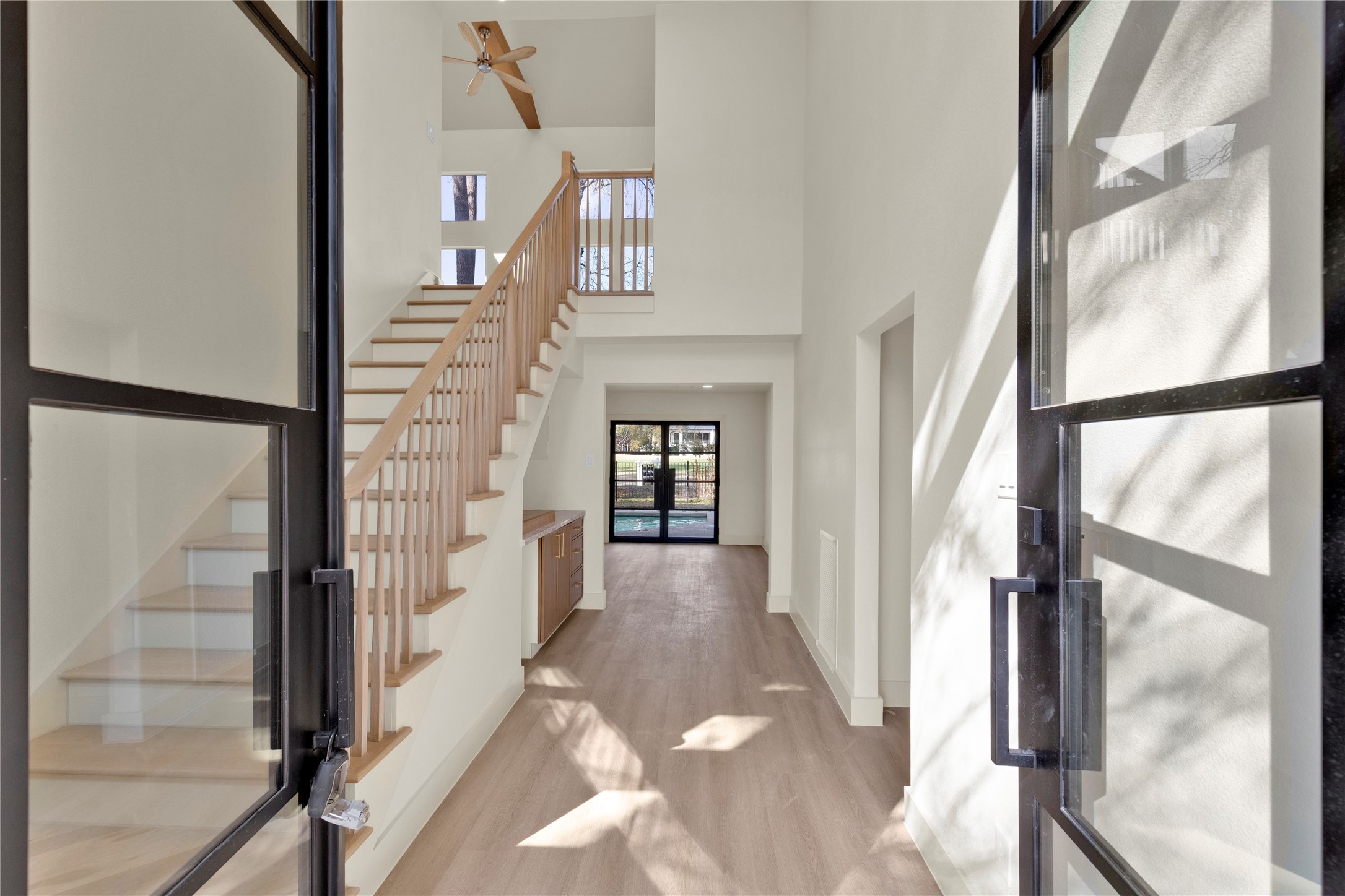 20 Buttonbush Court The Woodlands, TX 77380 - Photo 5 of 43 a view of a hallway with staircase