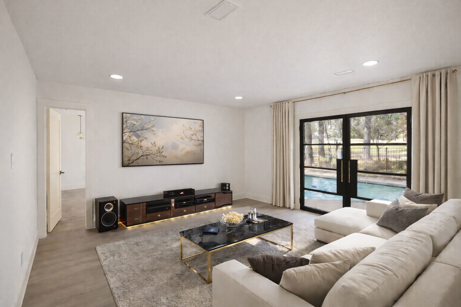 20 Buttonbush Court The Woodlands, TX 77380 - Photo 7 of 43 a living room with furniture window and a flat screen tv