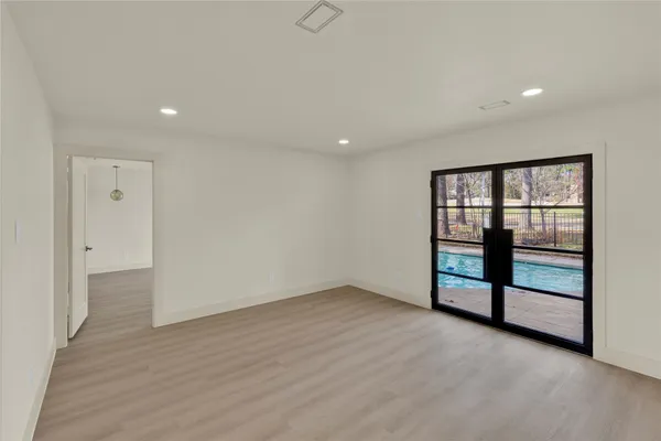 a view of hallway with furniture
