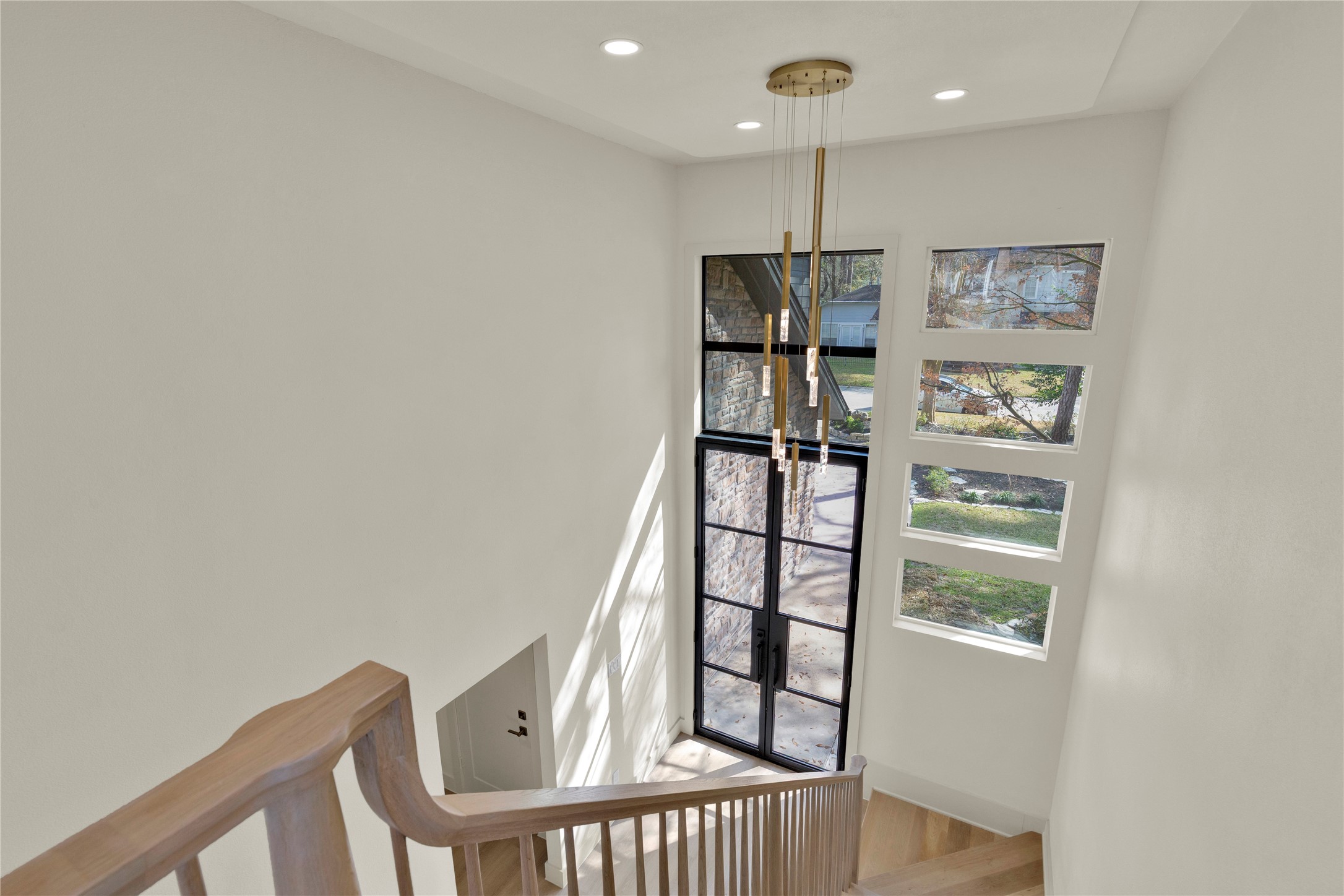 20 Buttonbush Court The Woodlands, TX 77380 - Photo 9 of 43 a view of hallway with furniture