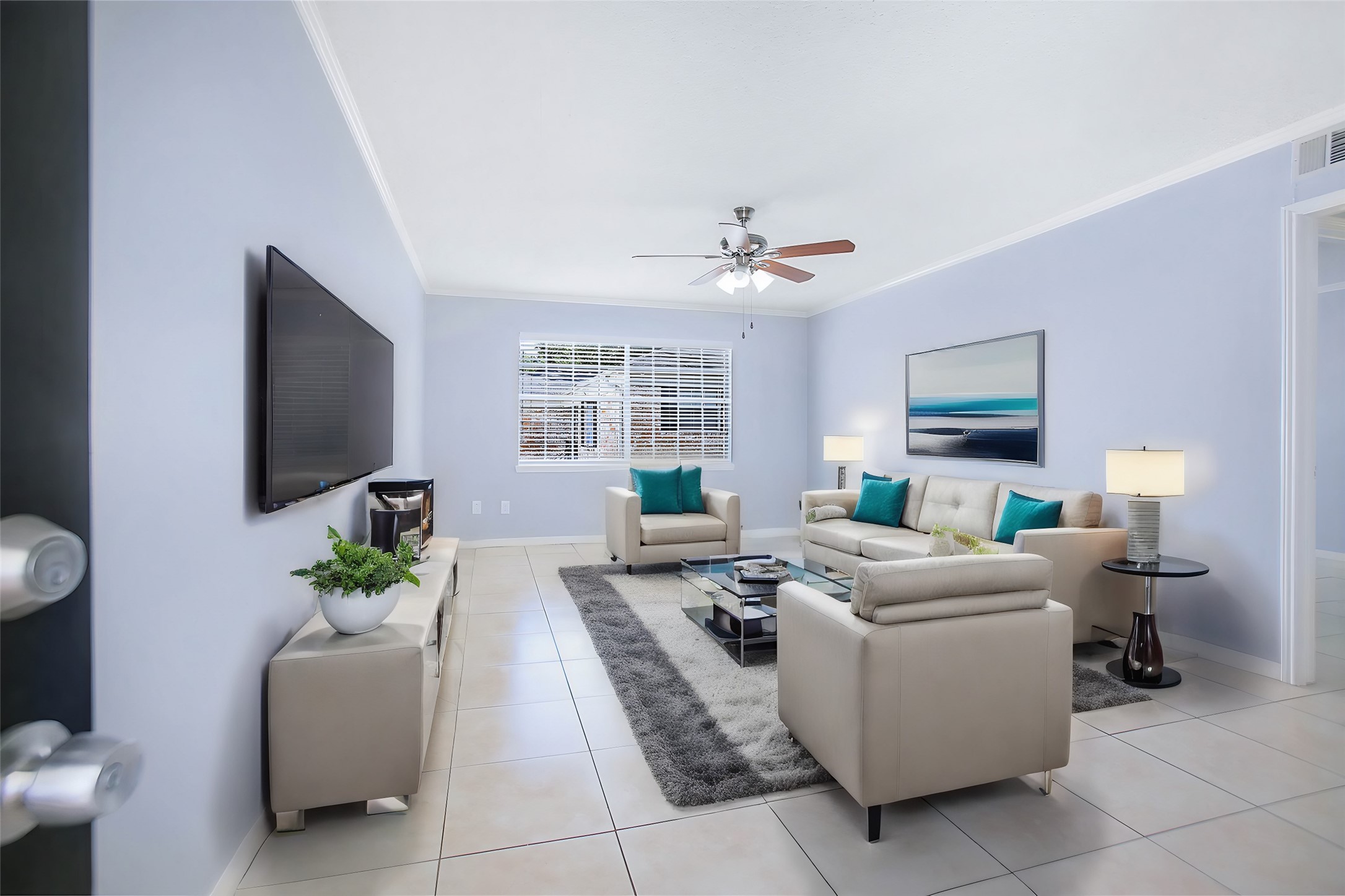 7900 Westheimer Road, Unit 134 Houston, TX 77063 - Photo 7 of 25 a living room with furniture a flat screen tv and a window