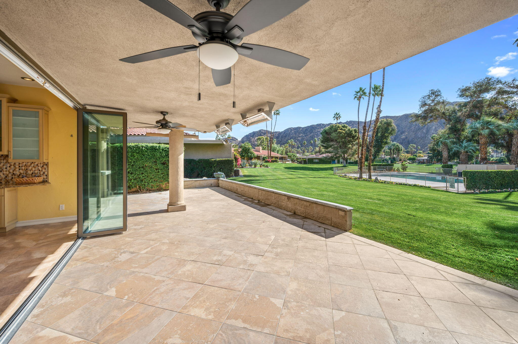 77675 Seminole Road Indian Wells, CA 92210 - Photo 29 of 40 a view of a porch with yard and staircase