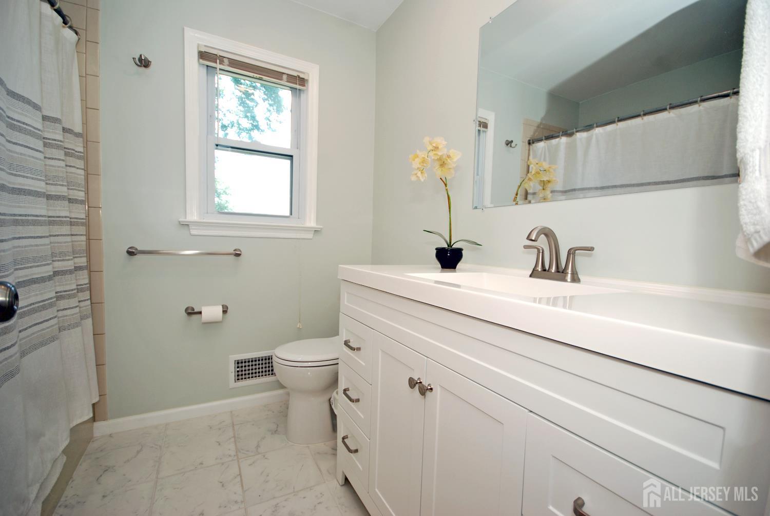 4 Kalman Court Middlesex, NJ 08846 - Photo 16 of 30 a bathroom with a sink and a toilet