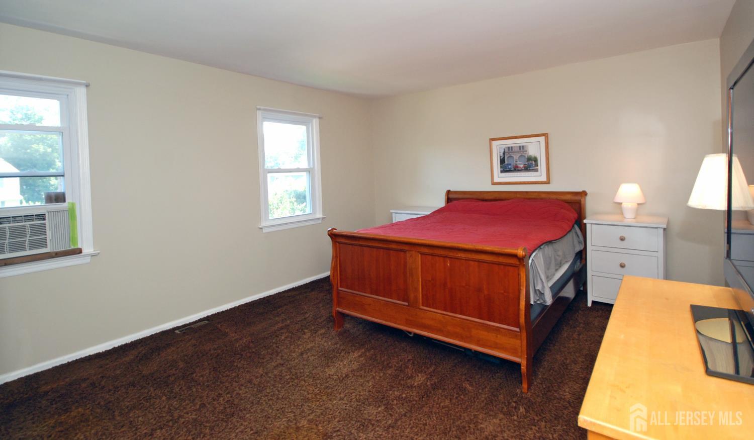 4 Kalman Court Middlesex, NJ 08846 - Photo 20 of 30 a utility room with a bed and a window