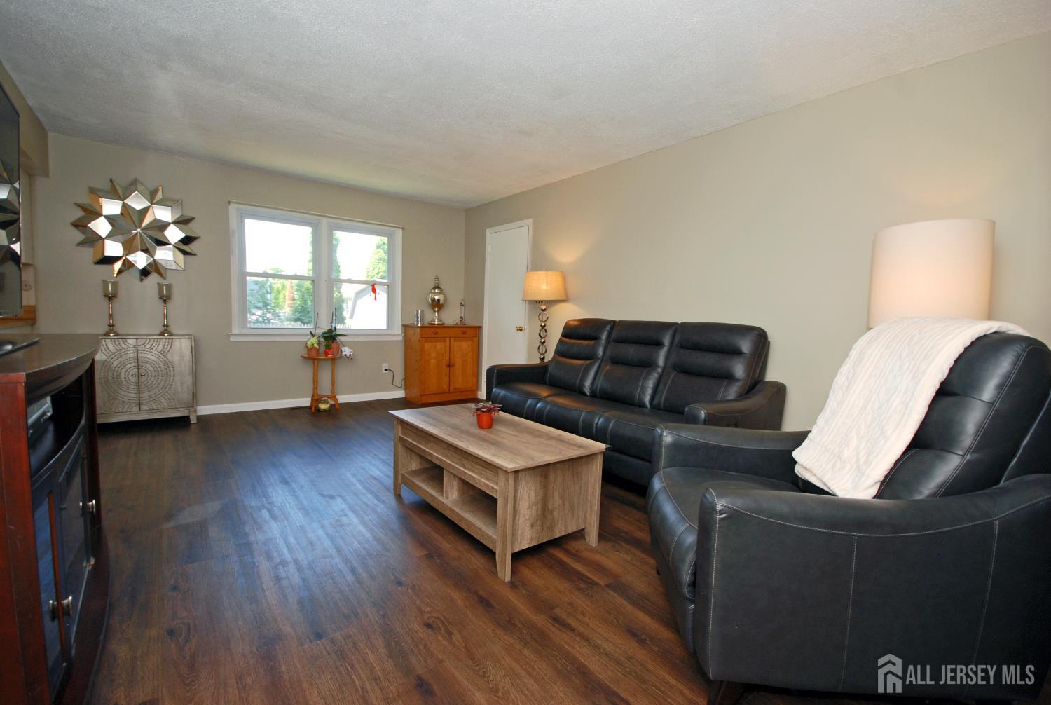4 Kalman Court Middlesex, NJ 08846 - Photo 9 of 30 a living room with furniture and wooden floor