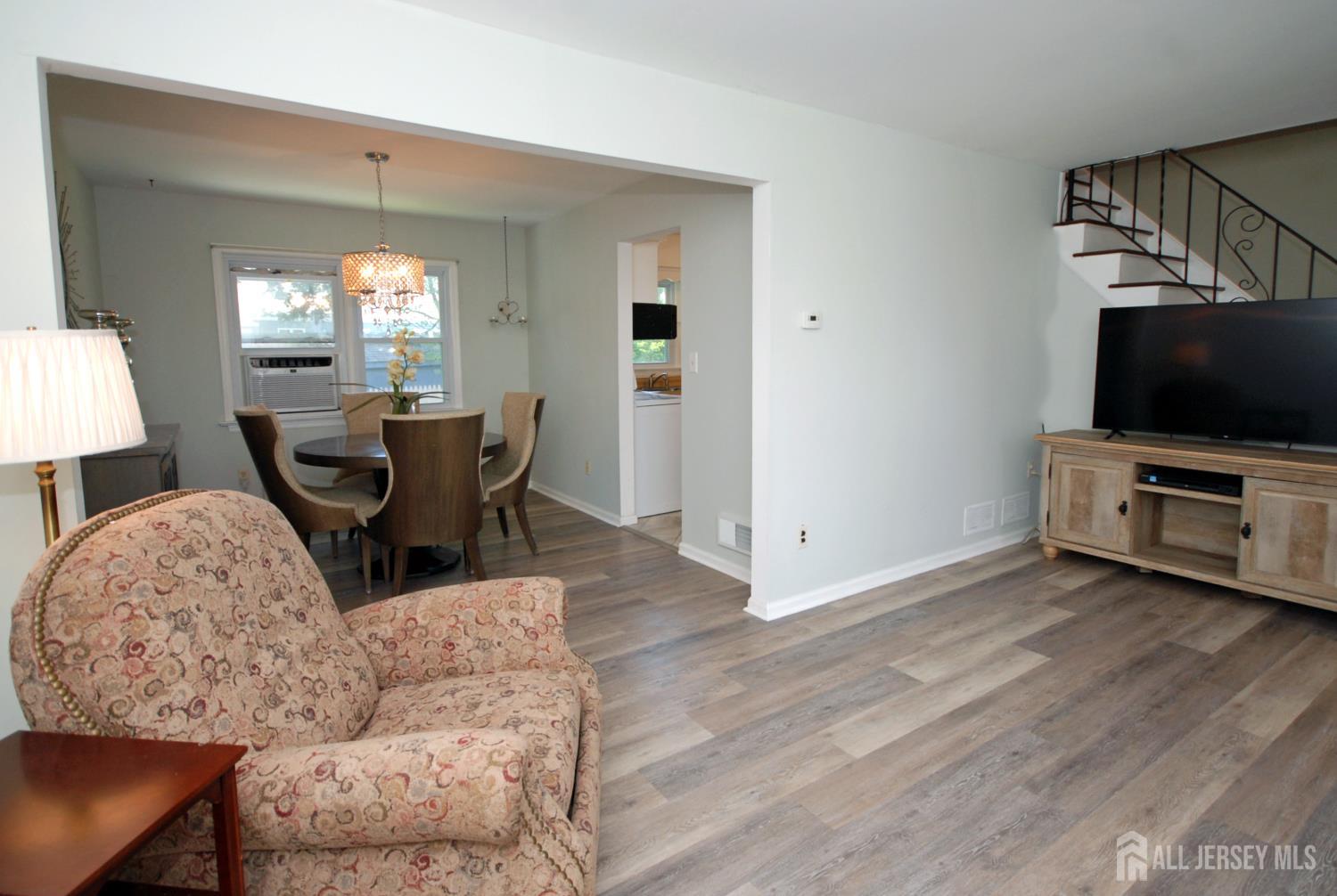 4 Kalman Court Middlesex, NJ 08846 - Photo 10 of 30 a living room with furniture and a flat screen tv