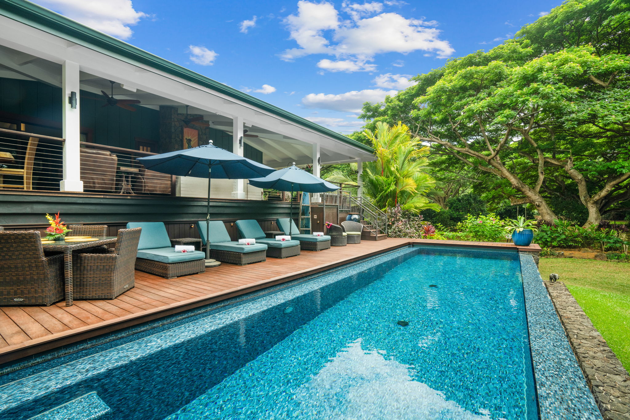 a view of a swimming pool with a patio