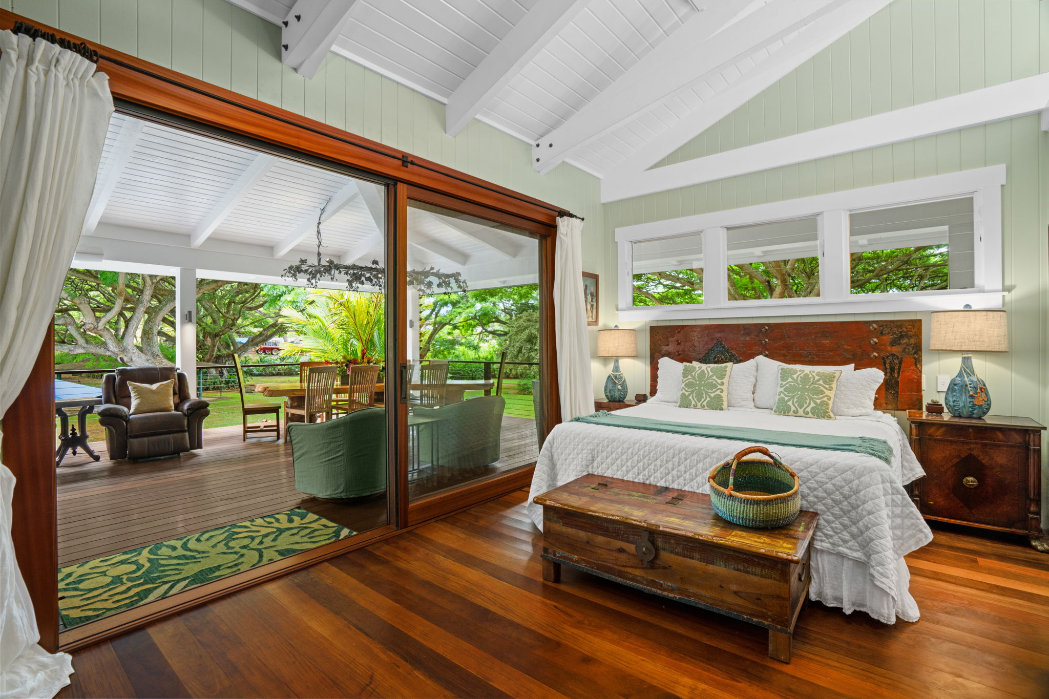 5311 A Hauaala Road Kapaa, HI 96746 - Photo 14 of 30 a bed sitting in a bedroom next to a large window