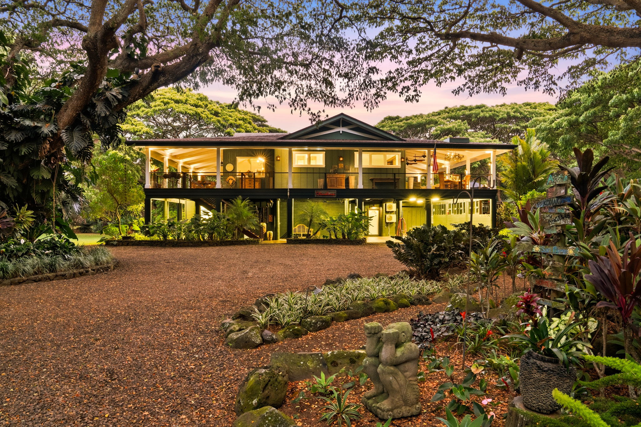5311 A Hauaala Road Kapaa, HI 96746 - Photo 2 of 30 a front view of a residential apartment building with a yard