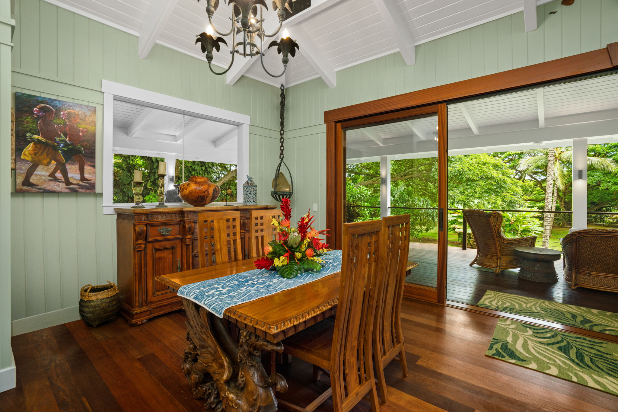 5311 A Hauaala Road Kapaa, HI 96746 - Photo 5 of 30 a living room with furniture a floor to ceiling window and wooden floor