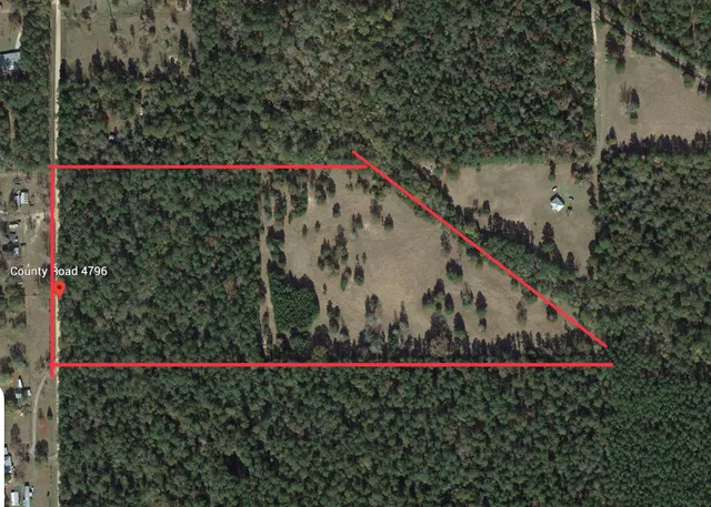 a view of a sign in front of a house