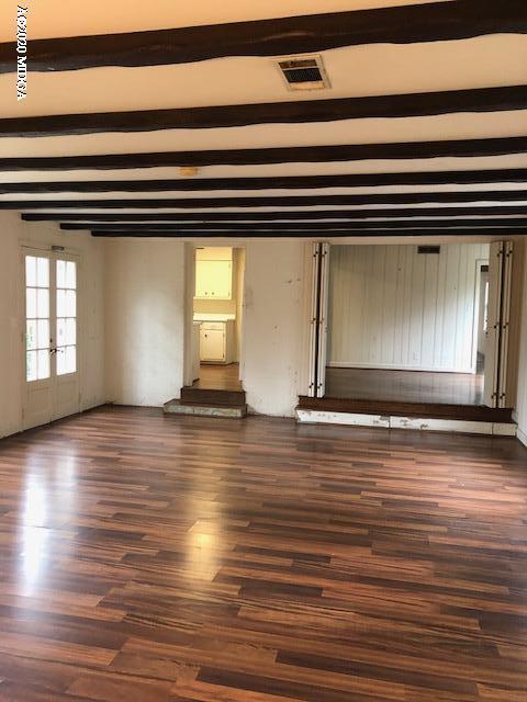 2300 Upper River Road Macon, GA 31211 - Photo 12 of 32 a view of empty room with window and wooden floor