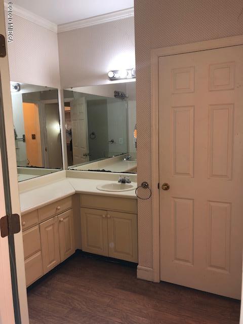 2300 Upper River Road Macon, GA 31211 - Photo 17 of 32 a spacious bathroom with a double vanity sink and a mirror