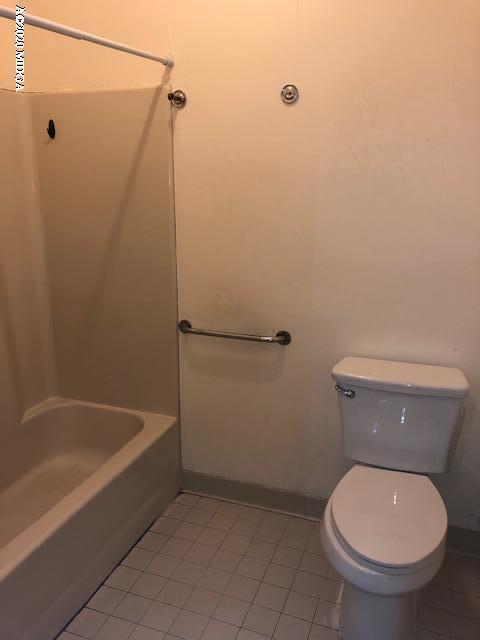 2300 Upper River Road Macon, GA 31211 - Photo 18 of 32 a white toilet sitting next to a bath tub