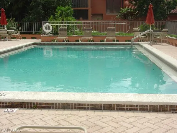 a view of swimming pool from a window