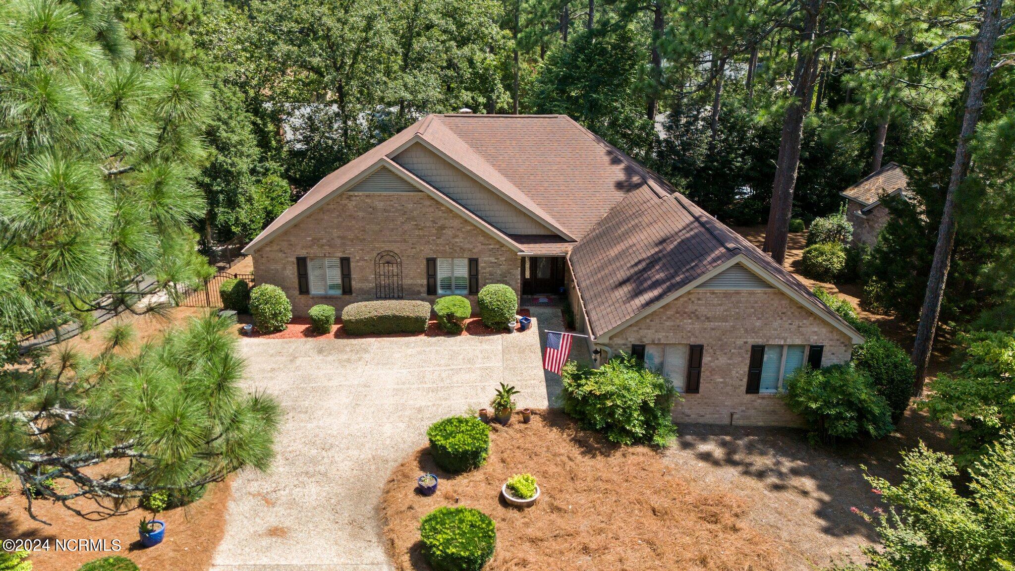 30 Doral Drive Pinehurst, NC 28374 - Photo 4 of 51 5-web-or-mls-DJI_20240821130554_0264_D