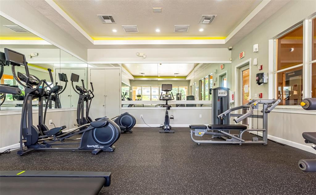 10101 Southwest 14th Street, Unit 2B9202 Pembroke Pines, FL 33025 - Photo 13 of 48 a view of a room with gym equipment