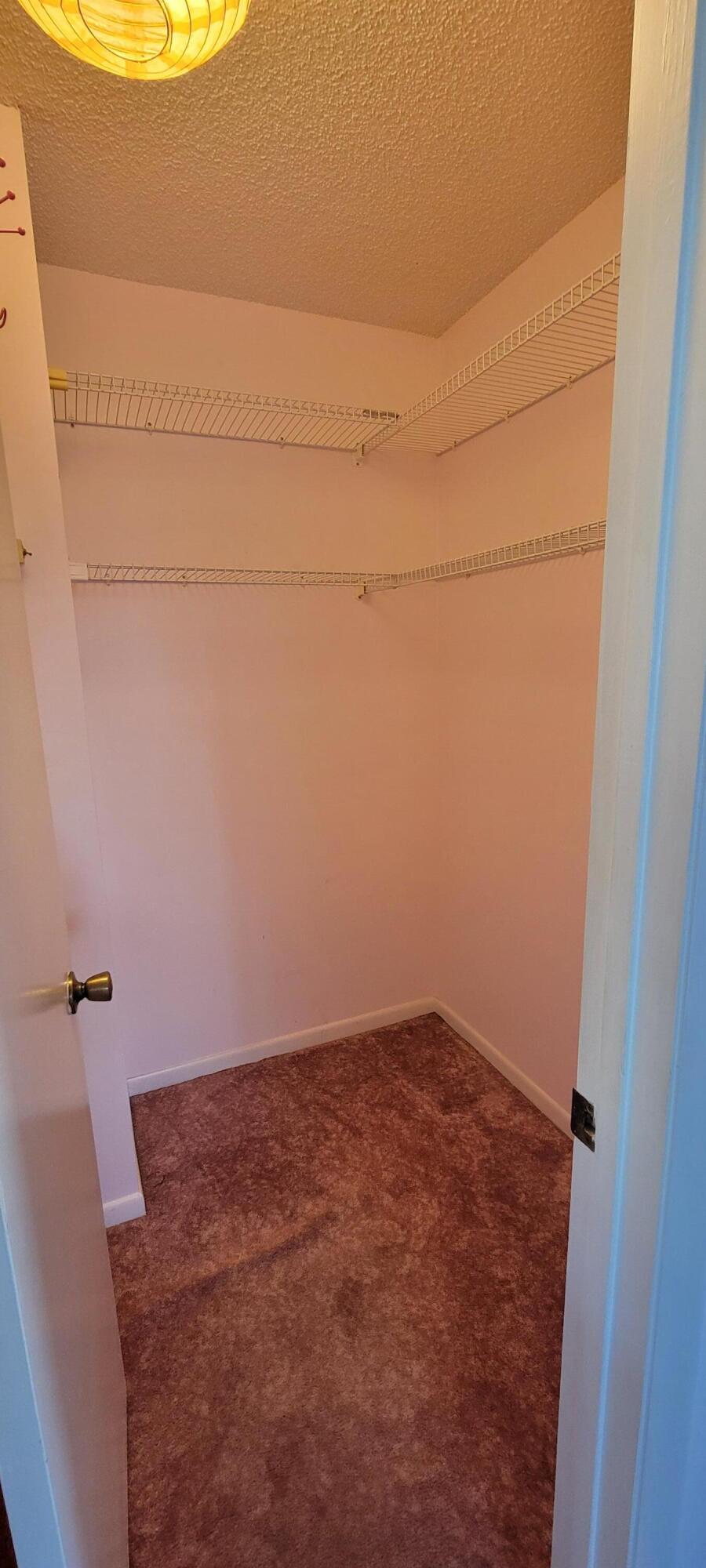 493 Southwest 28th Avenue Delray Beach, FL 33445 - Photo 23 of 48 an empty room with a white wall