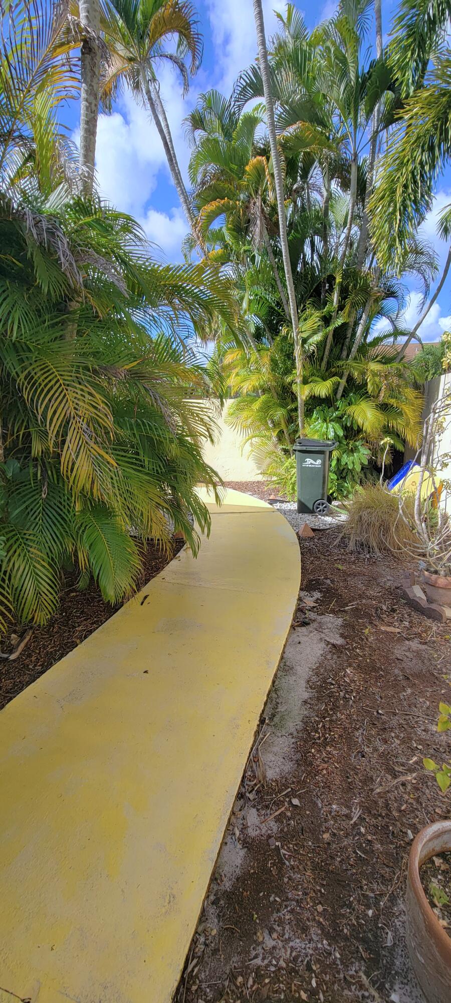 493 Southwest 28th Avenue Delray Beach, FL 33445 - Photo 37 of 48 a view of a yard