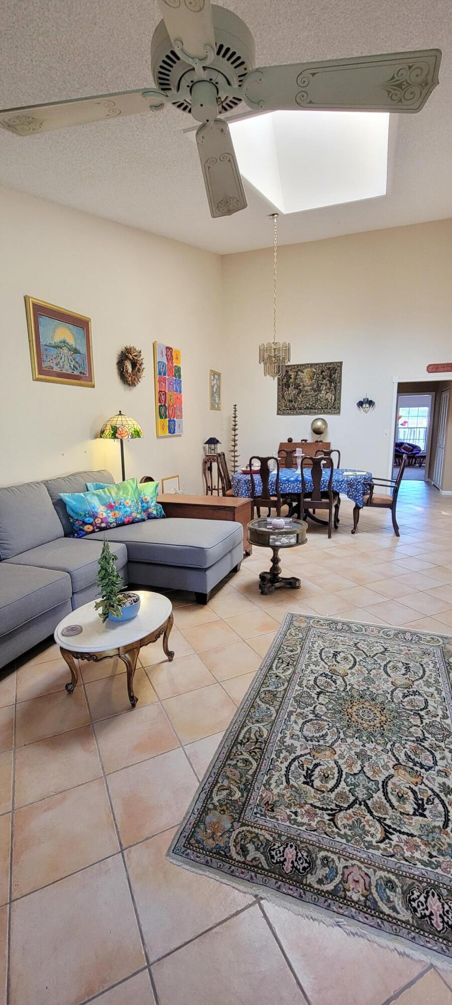 493 Southwest 28th Avenue Delray Beach, FL 33445 - Photo 10 of 48 a living room with furniture and a couch