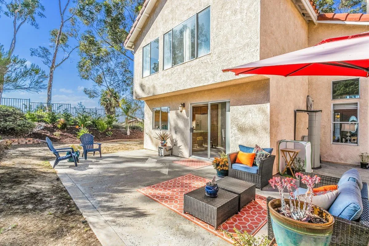 1501 Promontory Ridge Way Vista, CA 92081 - Photo 19 of 22 a glass building with outdoor space