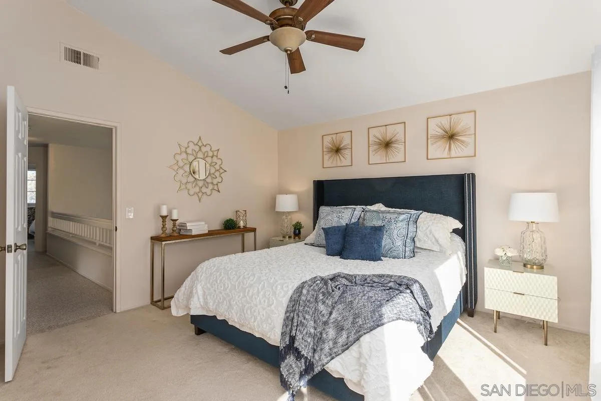 1501 Promontory Ridge Way Vista, CA 92081 - Photo 10 of 22 a bedroom with a bed and closet