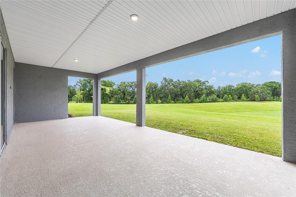 6488 Southwest 78th Court Ocala, FL 34474 - Photo 33 of 40 a view of an empty room with a yard